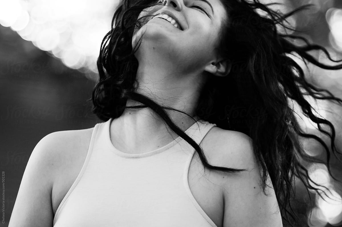 Babe Woman Laughing With Her Hair Blowing In The Wind By Stocksy Contributor Chelsea