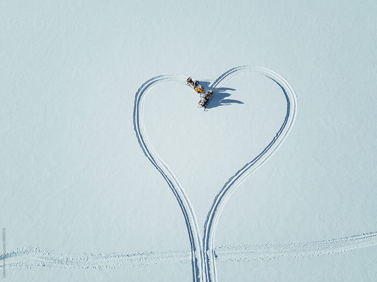 Heart on a white snow