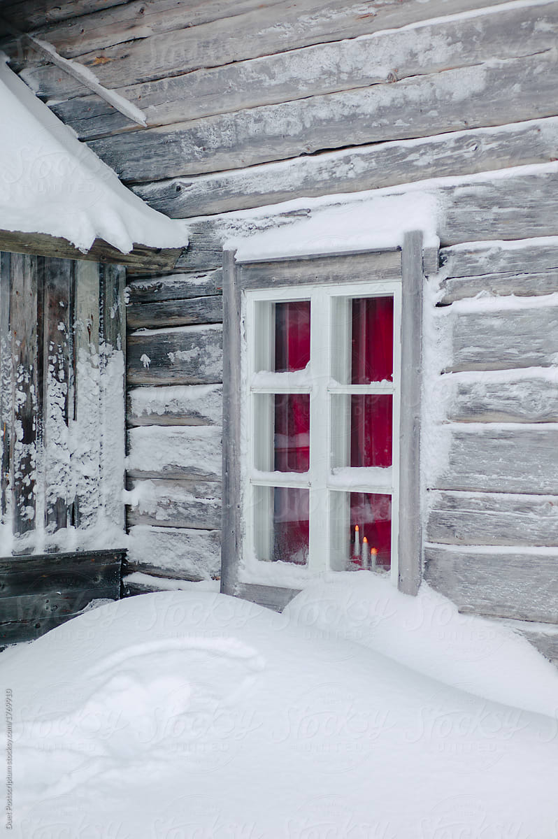 House window covered with snow
