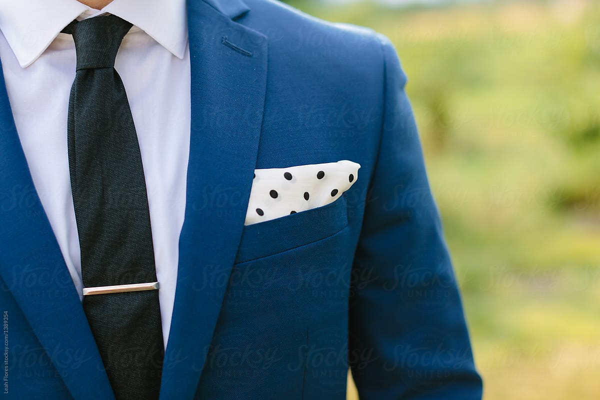 Man in Blue Suit with Polka Dot Pocket Square