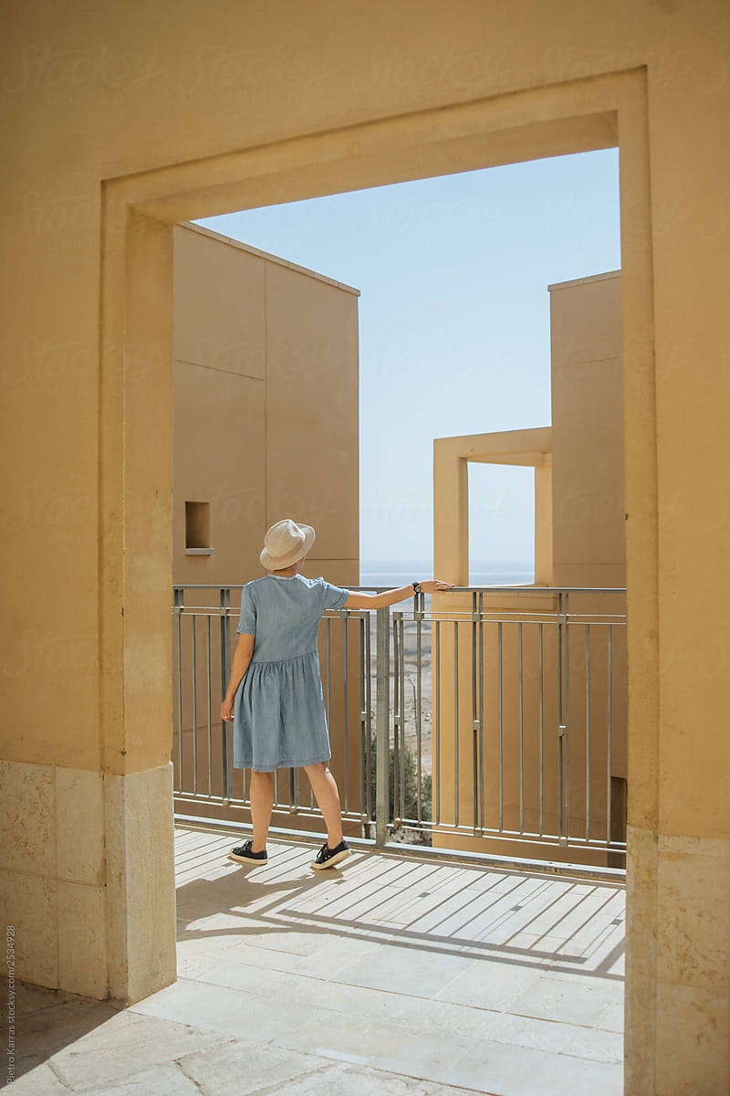 Anonymous woman on hotel terrace