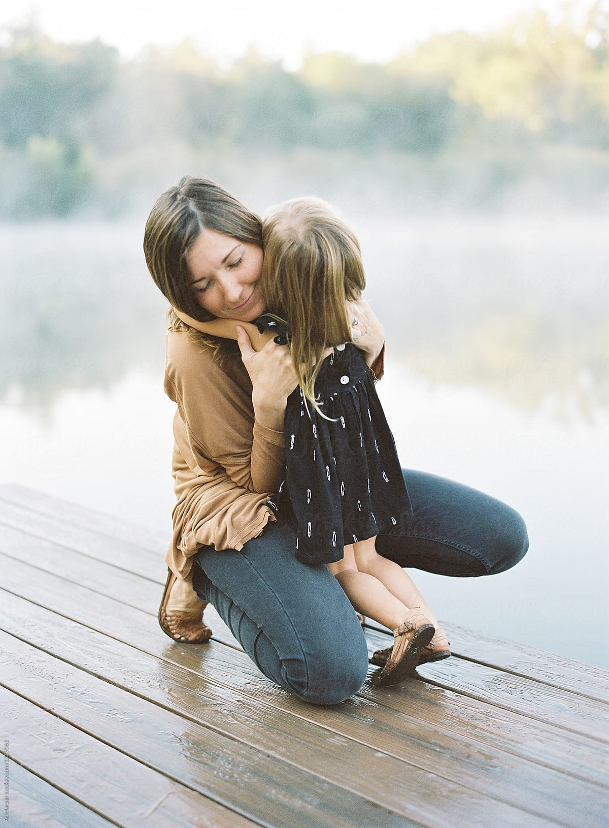 Mother And Daughter Embracing By Stocksy Contributor Ali Harper Stocksy