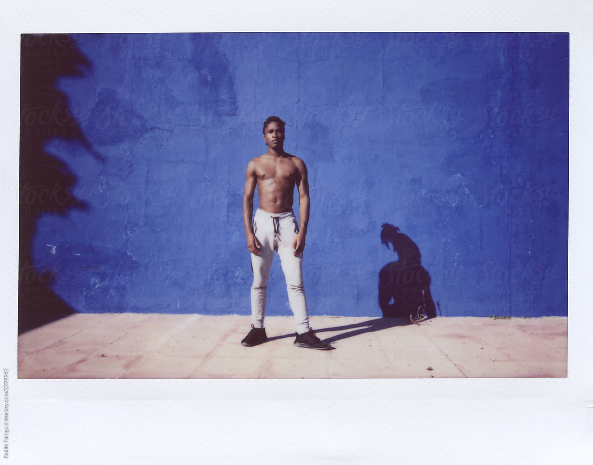 "Shirtless Black Man Outdoors On Picture" by Stocksy Contributor