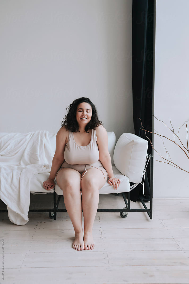 Portrait of young sensual plus size woman.
