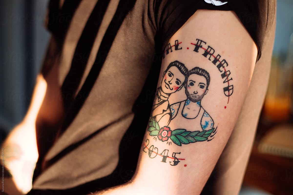 Gay Tattoo On Man Arm