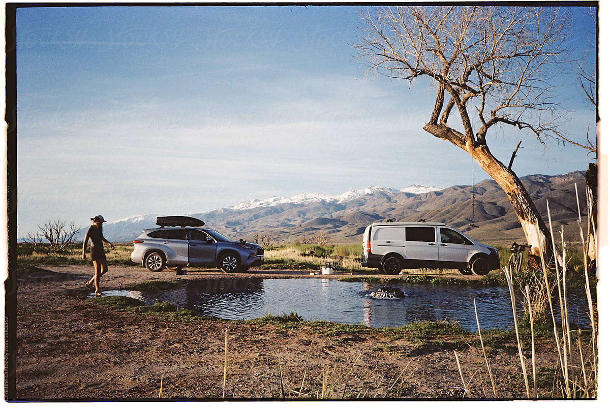 Film photo: roadtrip campers by swimming hole