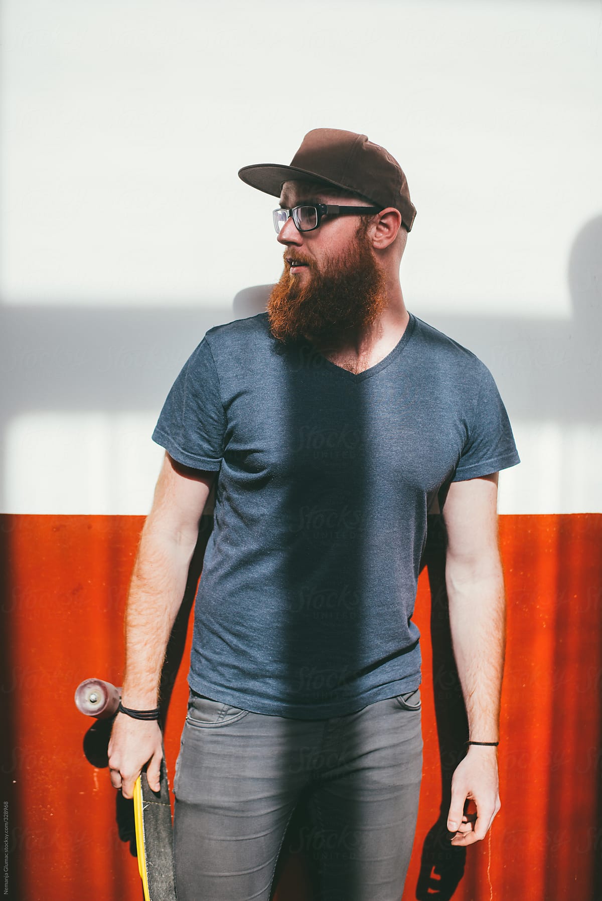 Young Alternative Skater With Red Beard