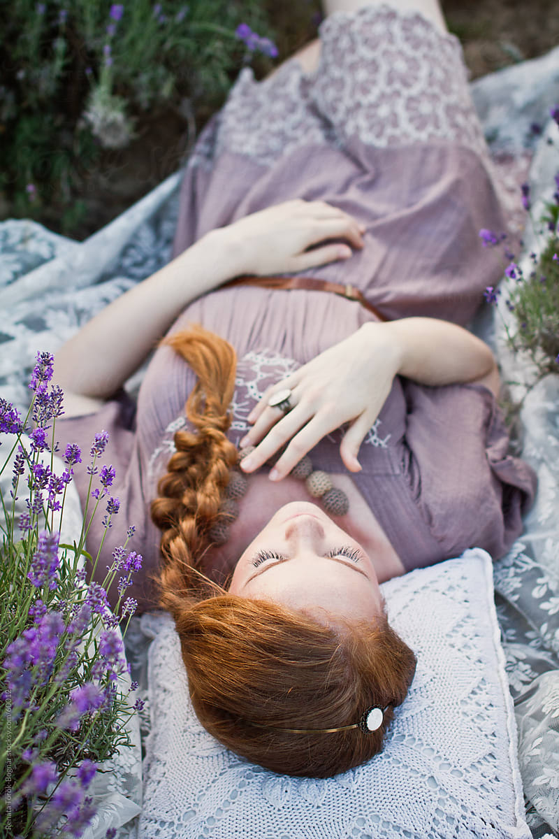 Beautiful redhead in the lavender fields