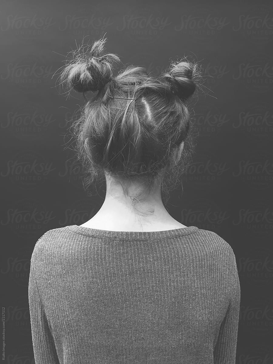 Portrait of thirteen year old girl looking away from camera