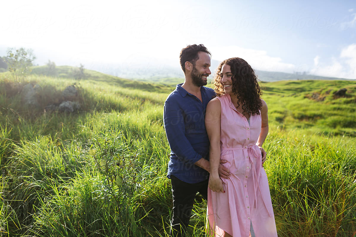Young Couple Together Outside Laughing And Hugging In Nature By Stocksy Contributor Rob And 5036