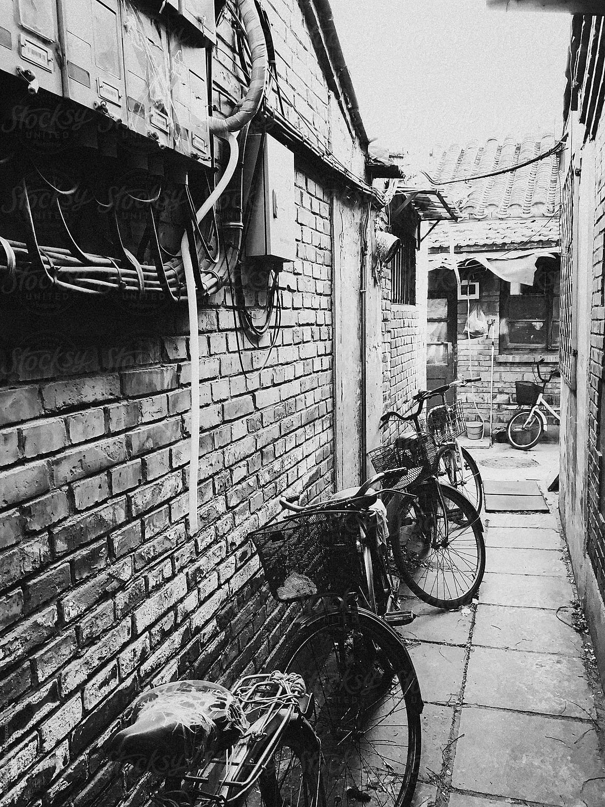 Bicycles Standing in Old Beijing Alley