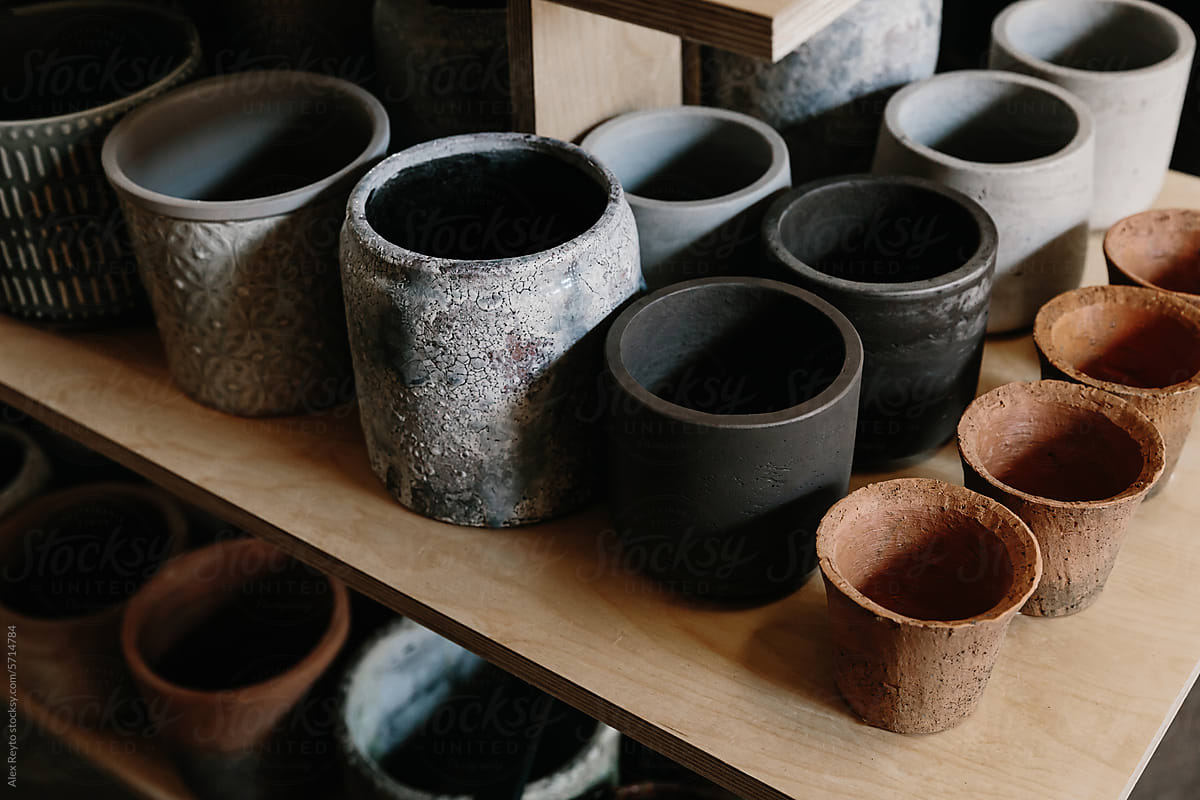 Variety of small ceramic planter pots.