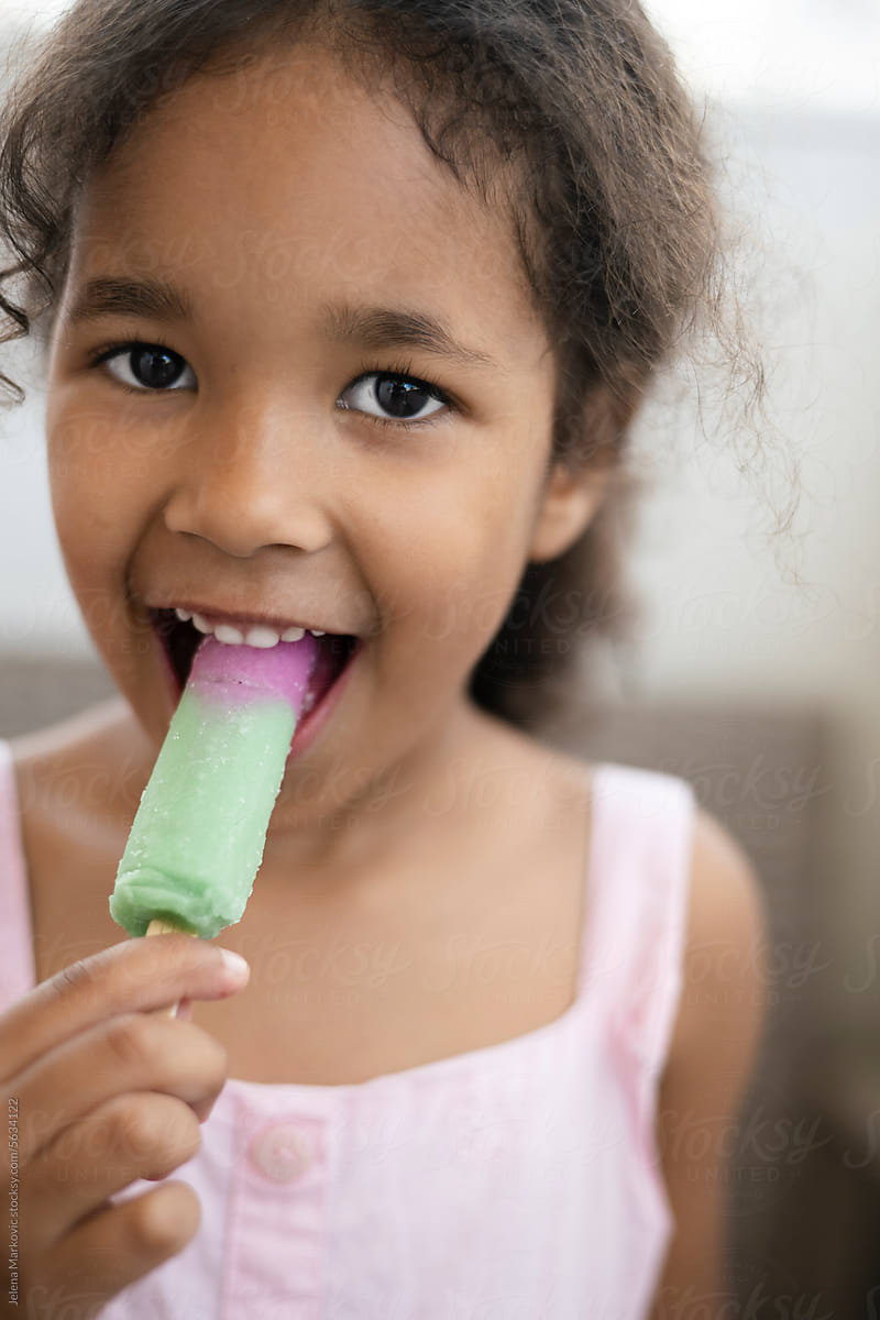 toddler eating popsicle