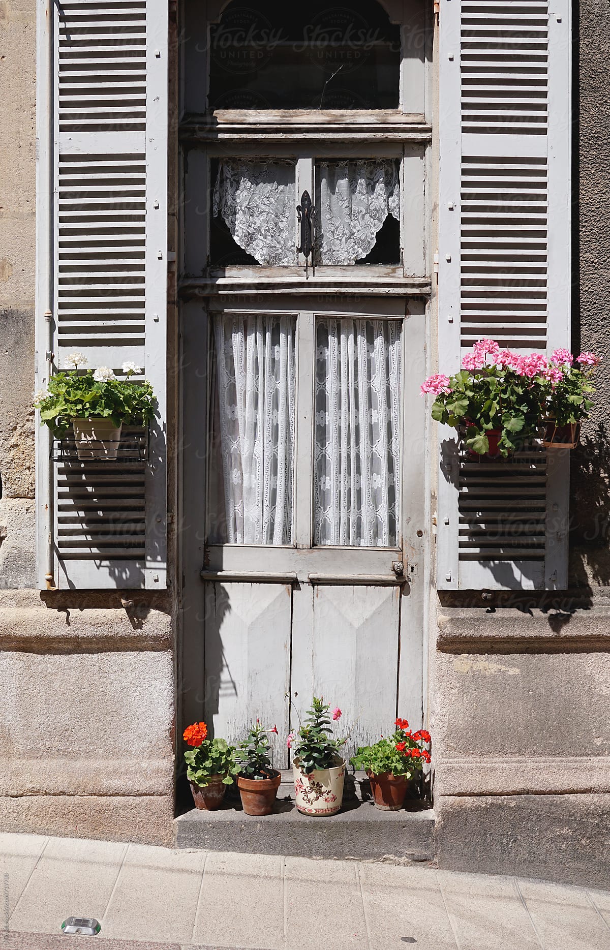French house decorated with flowers