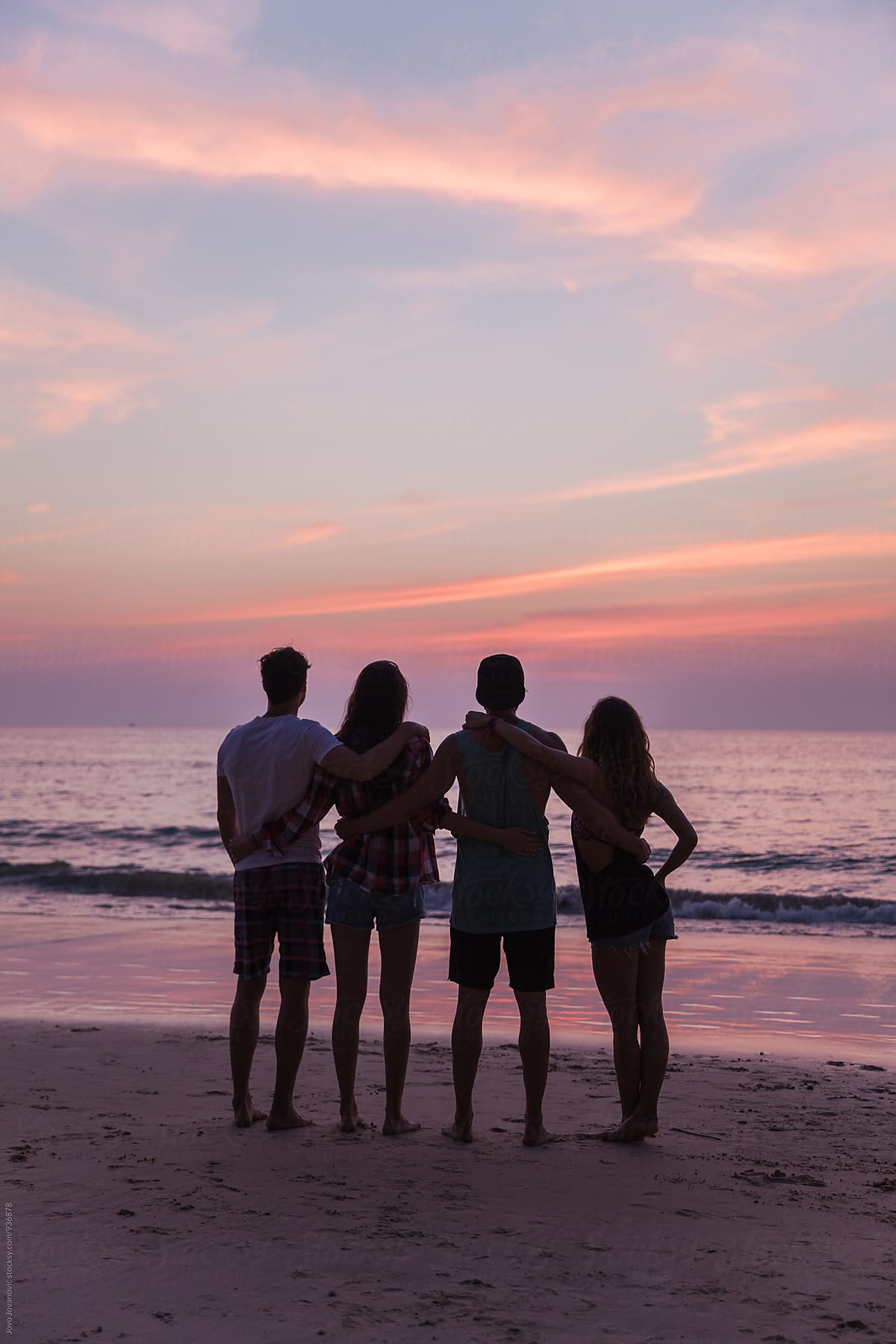 Group Of Friends Watching Sunset Together At The Beach By Jovo