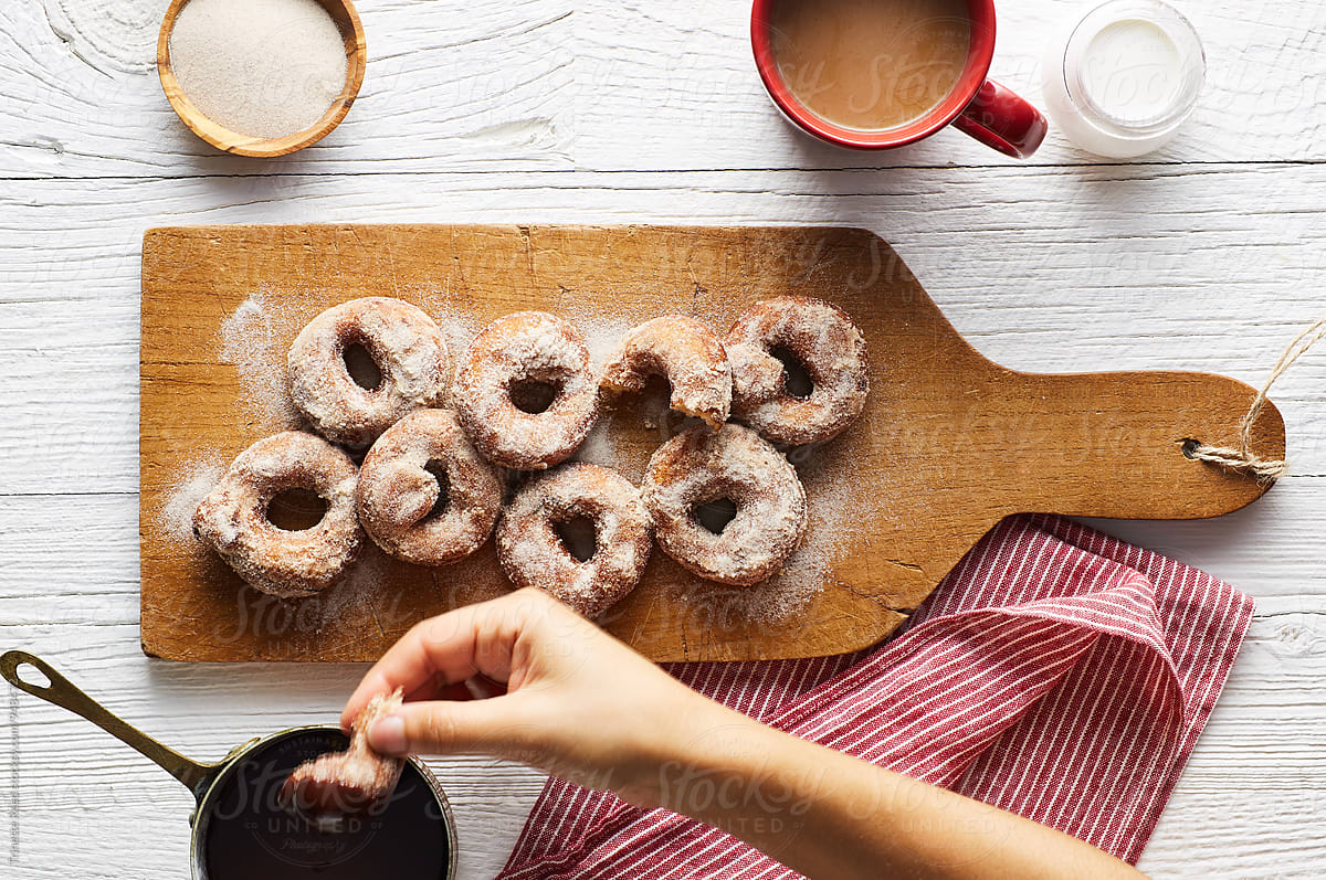 Homemade donuts with sugar and chocolate dipping sauce