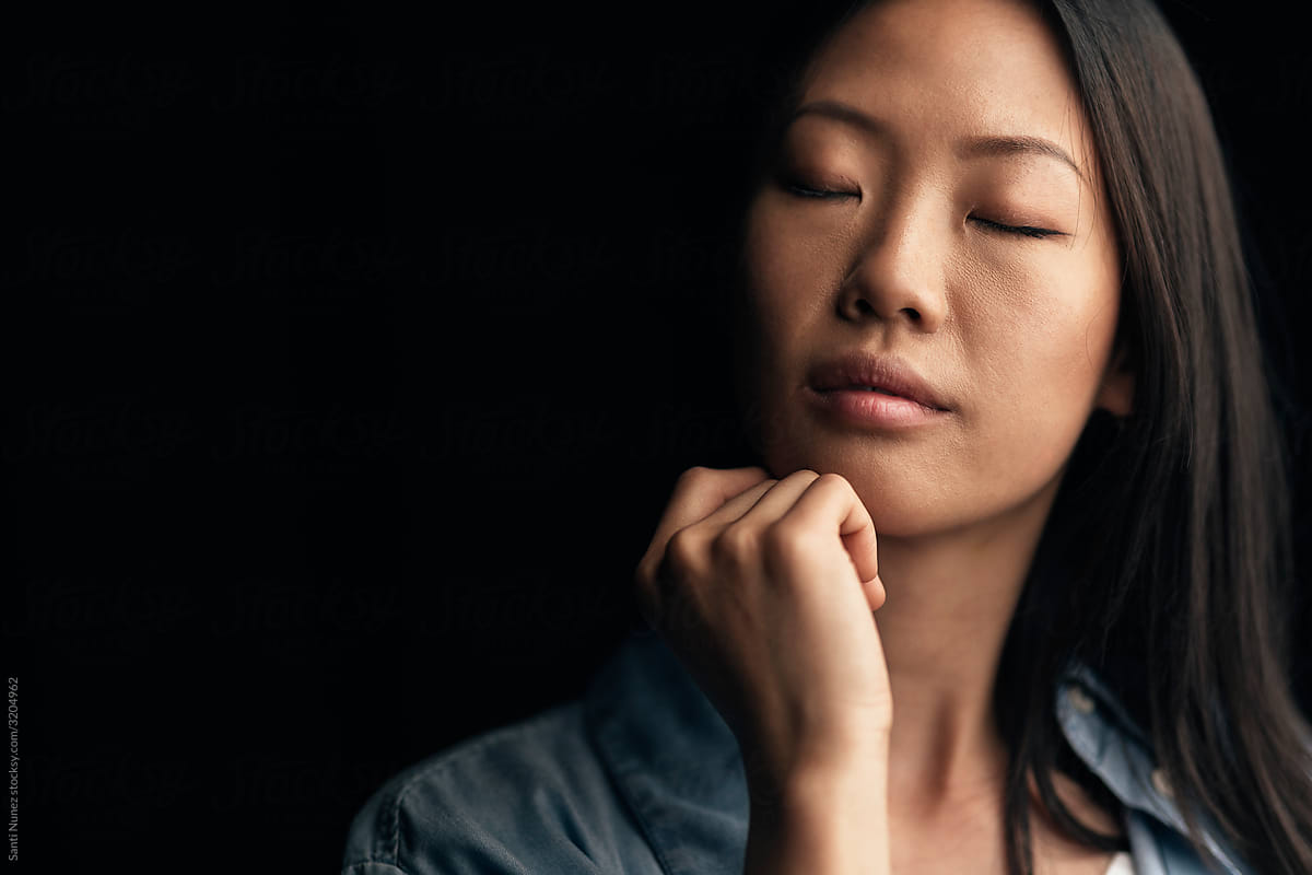 Portrait of Dreamer Asian Woman