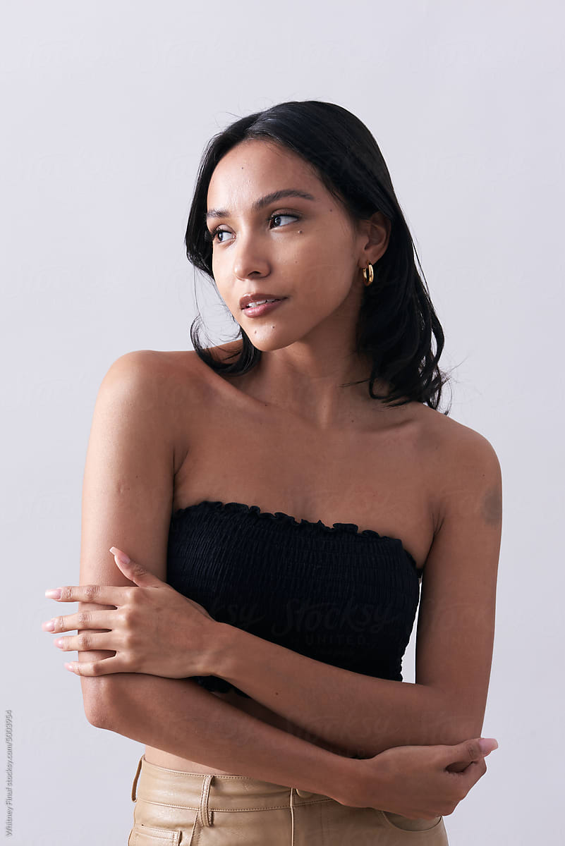 Fashion Portrait of Young Latina Woman with Black Crop Top