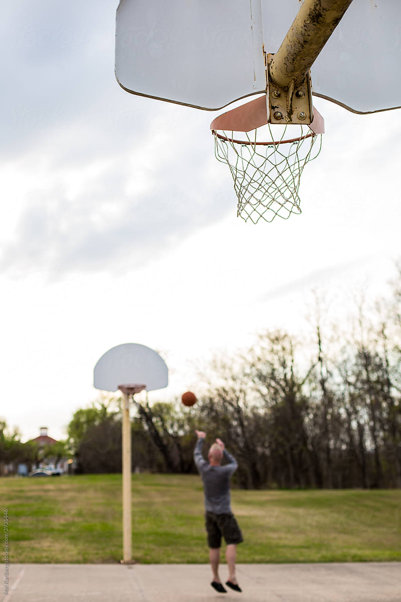 Man shooting a basketball