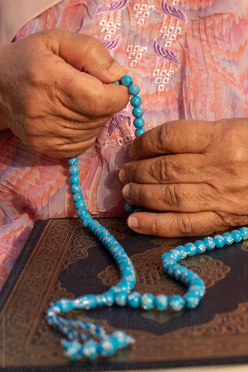 Grandmother holding sebha on Eid