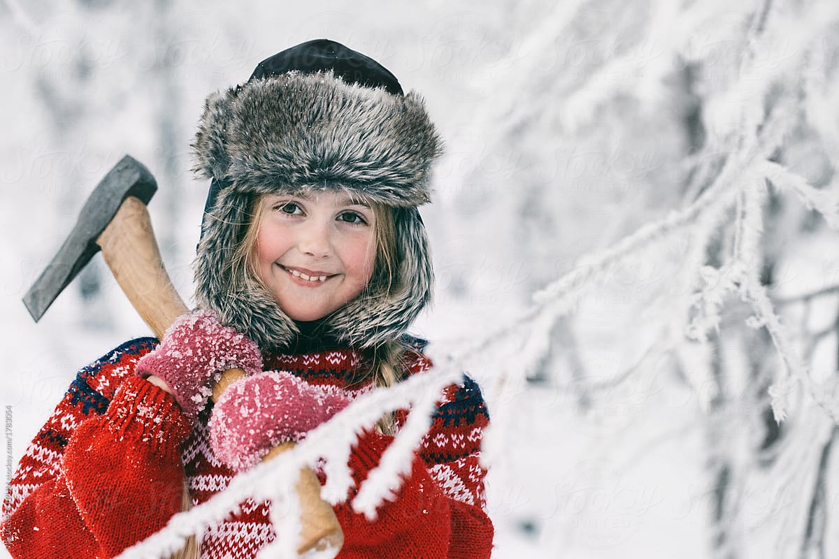 Winter Headshot Of Cute Smiling Norwegian Girl Holding Axe On Shoulder