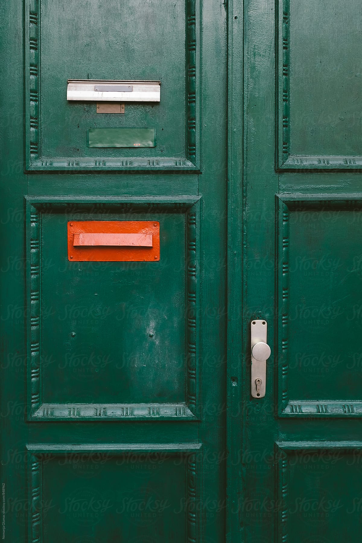 Green Wooden Door With Red Mailbox