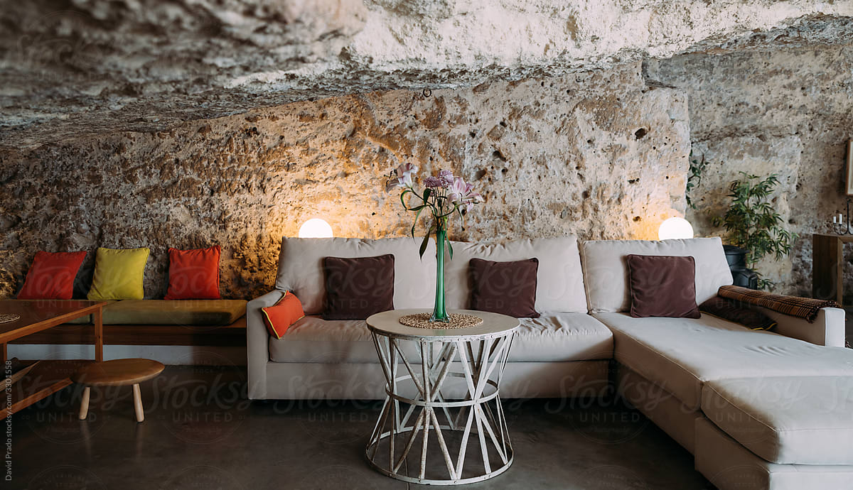 Modern interior design of living room inside rock