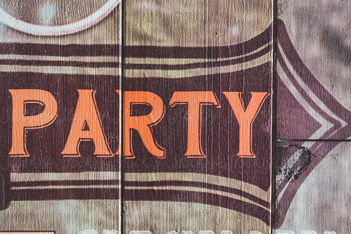 party-sign-on-a-wall-by-stocksy-contributor-mauro-grigollo-stocksy