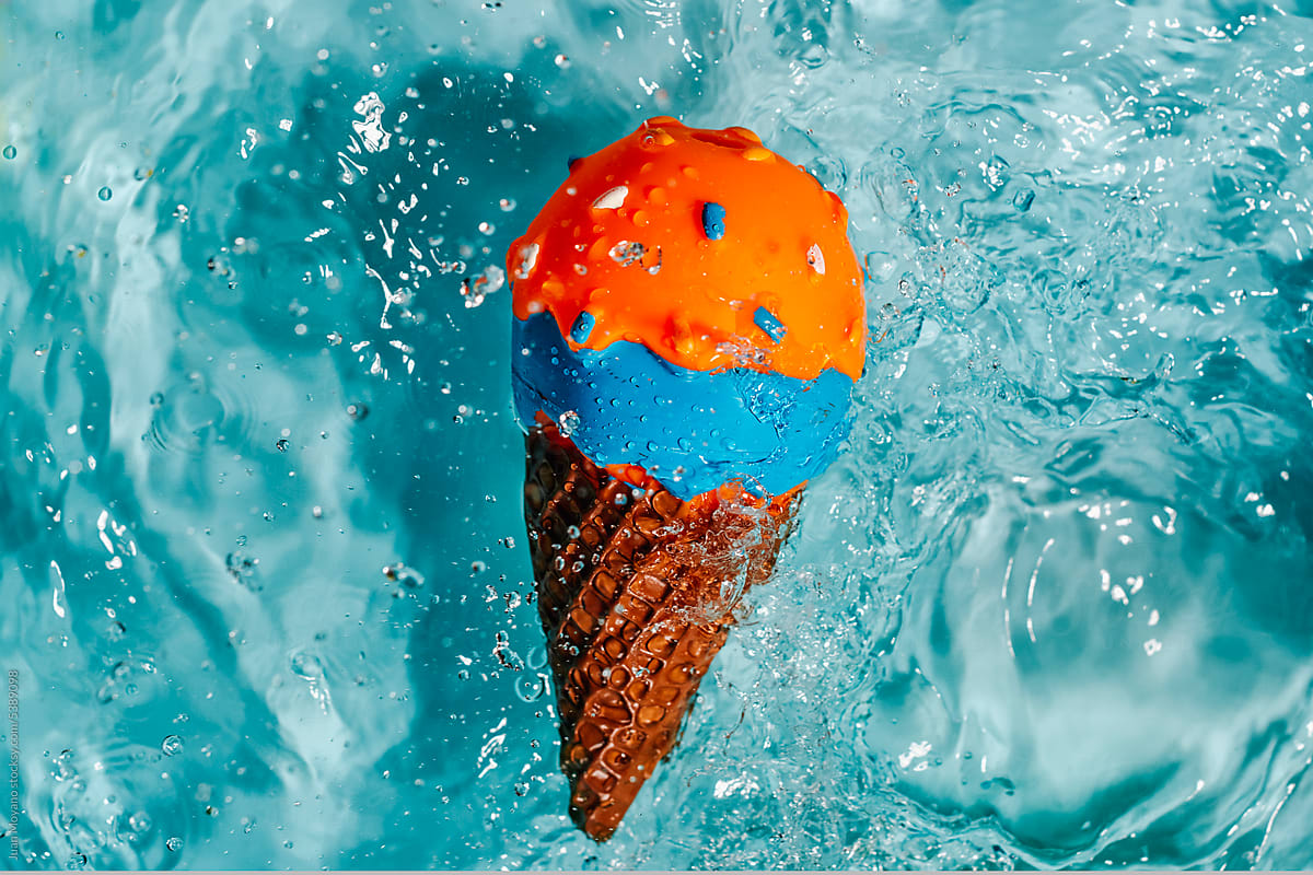 plastic ice cream cone floating on the water