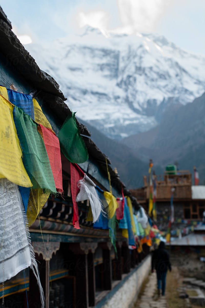 Traditional Buddhist\'s Prayer flag on a windy day in Himalayas