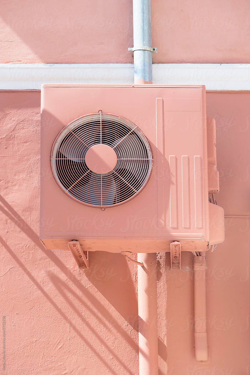 pink air conditioning on a pink wall