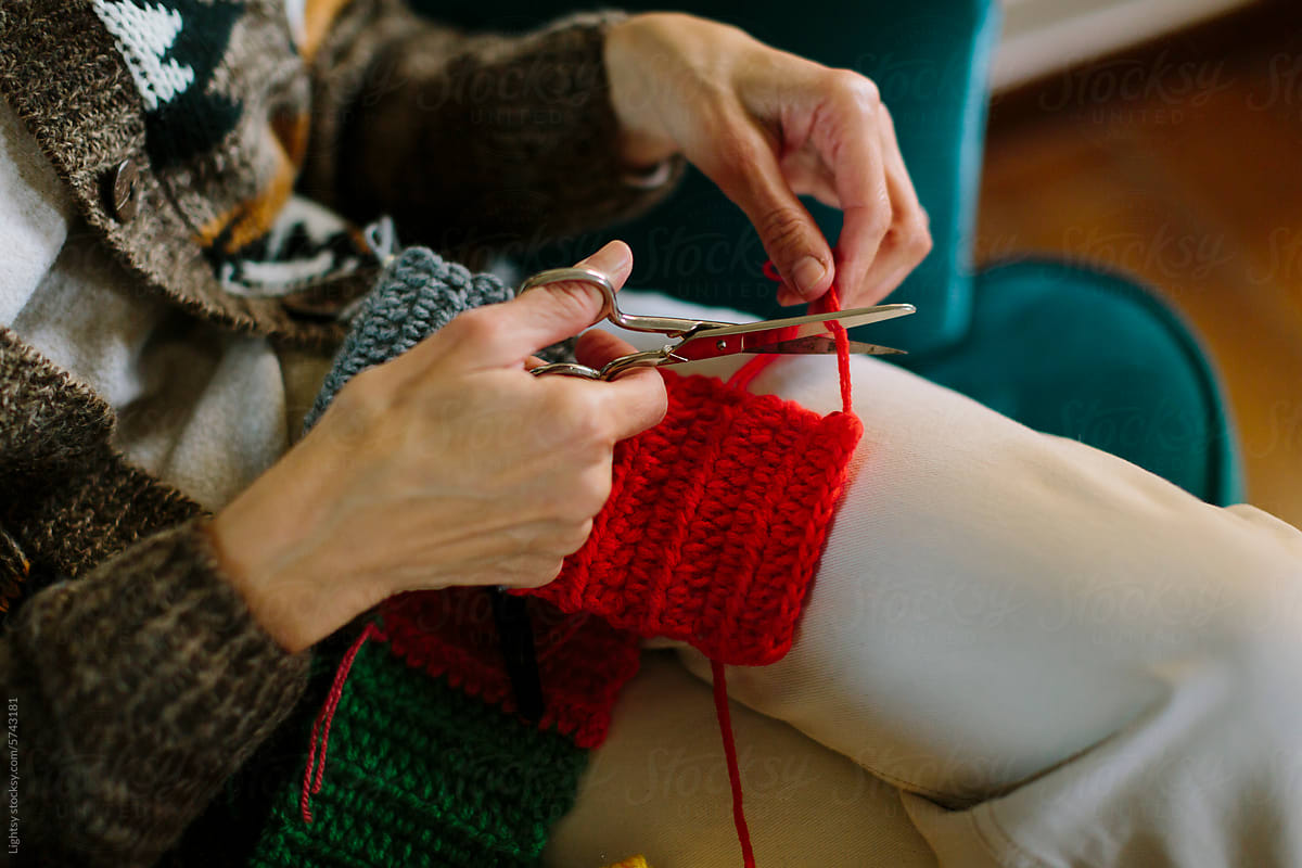 Hands of a senior woman knitting