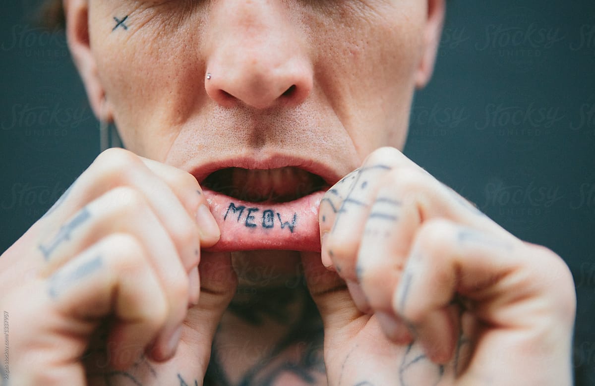Tattoo inside his lip