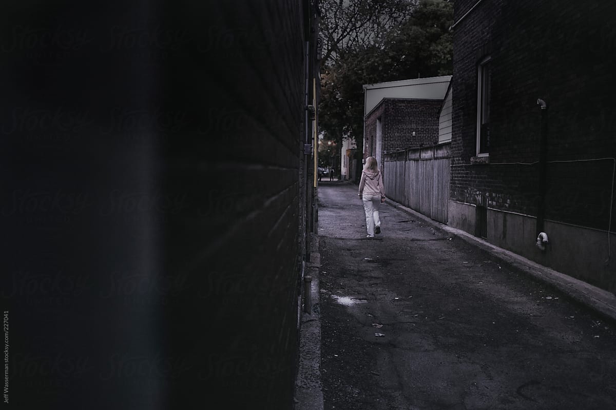 Woman in Dark Alley