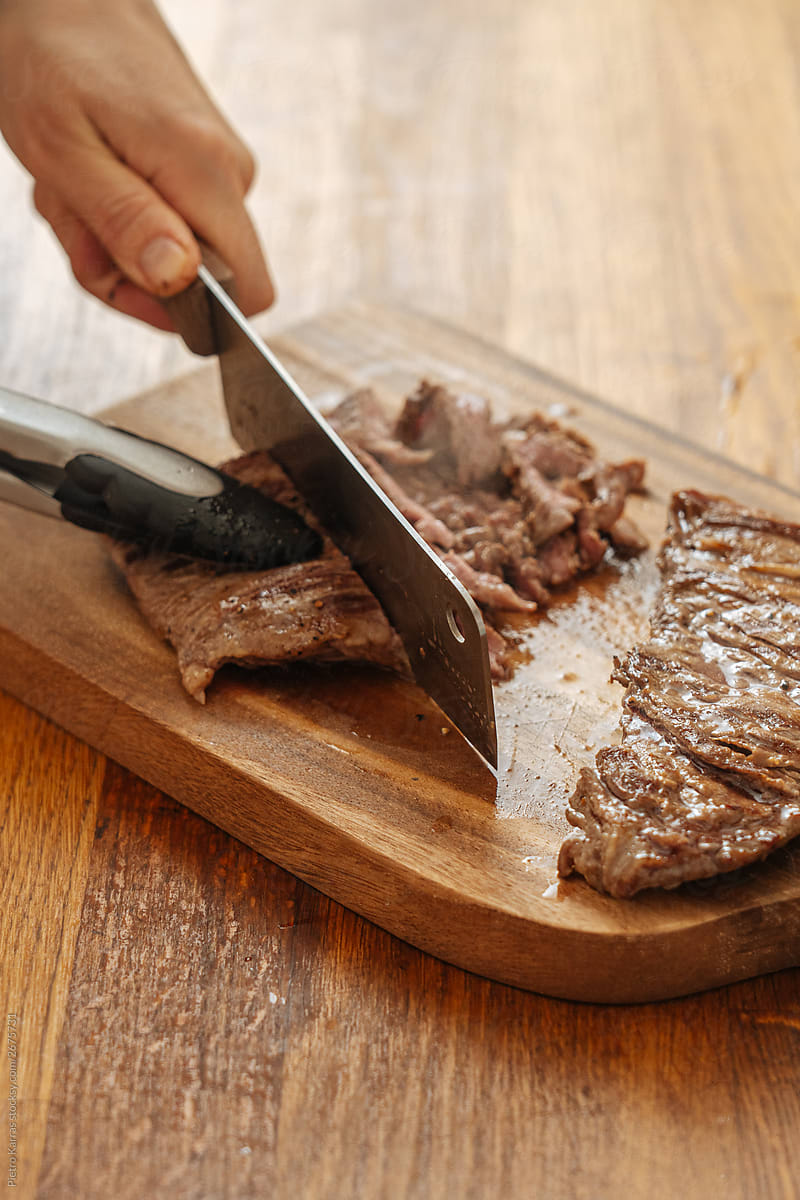 Cook slicing meat with chop knife