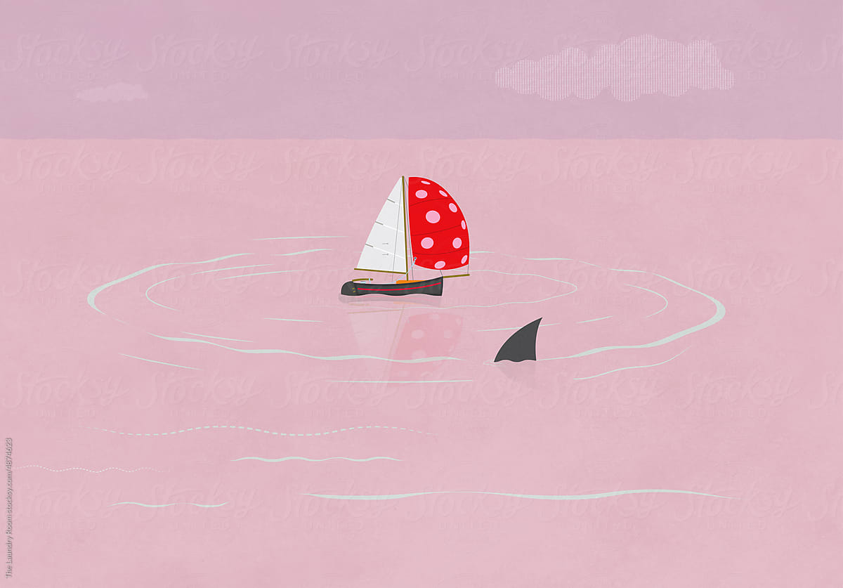 Shark circling sailing boat with red spinnaker.
