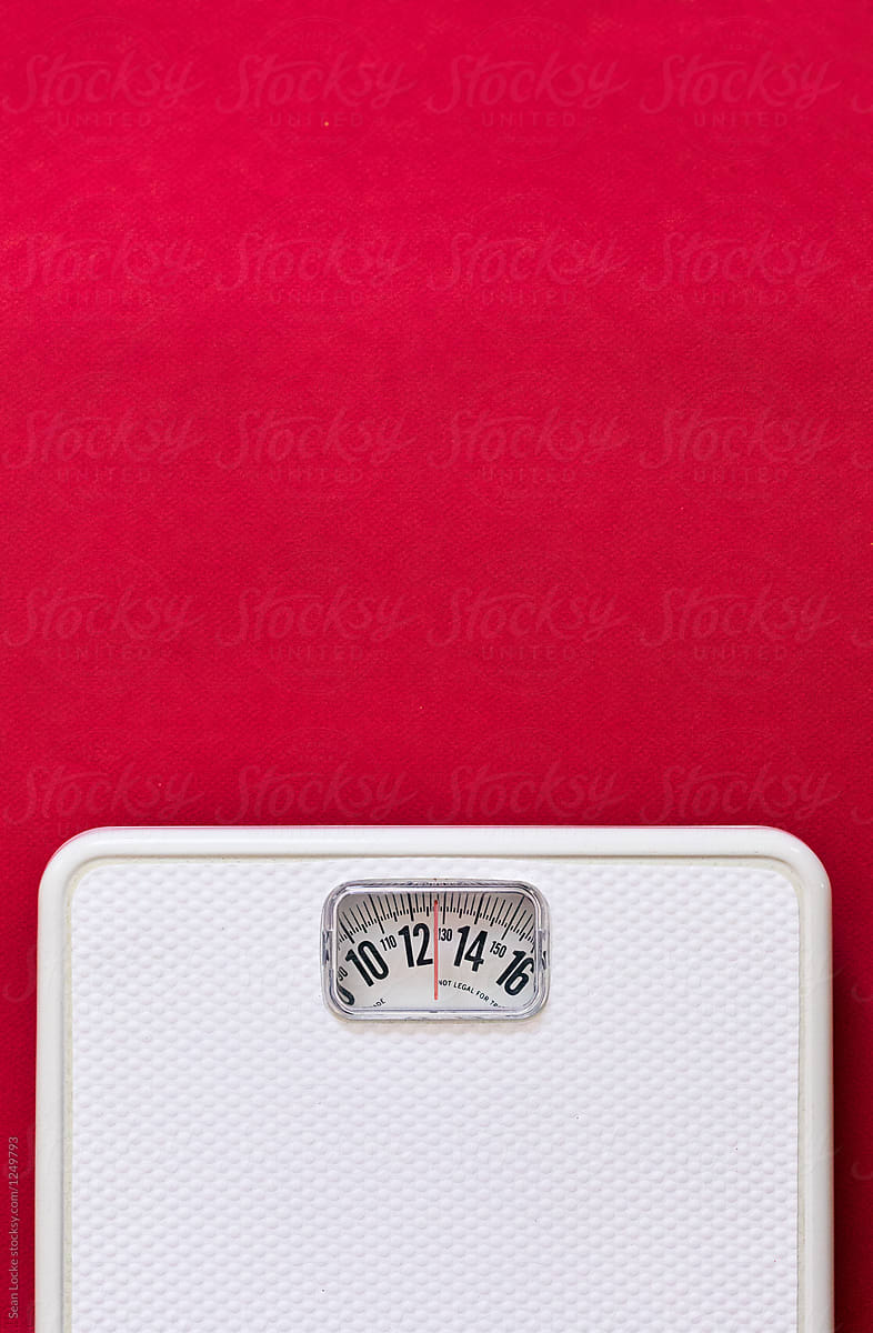 Scale On Red Background