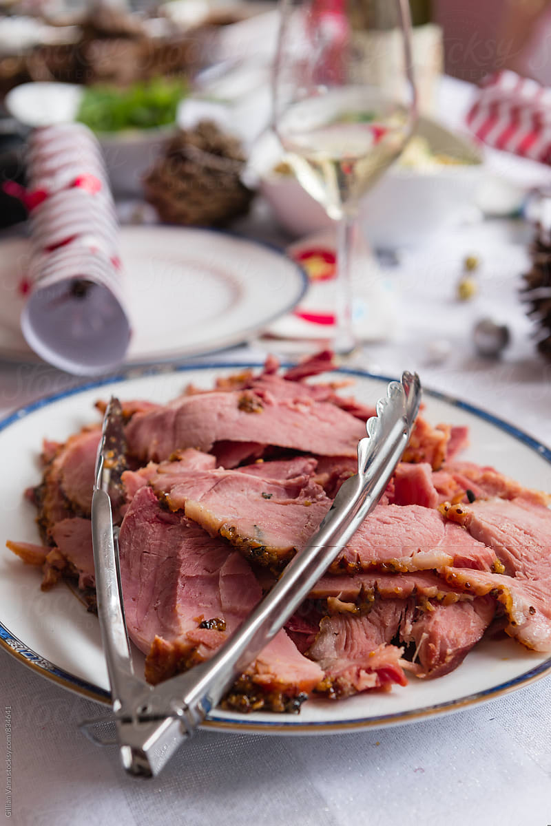 a plate of sliced ham set out for christmas lunch in Australia