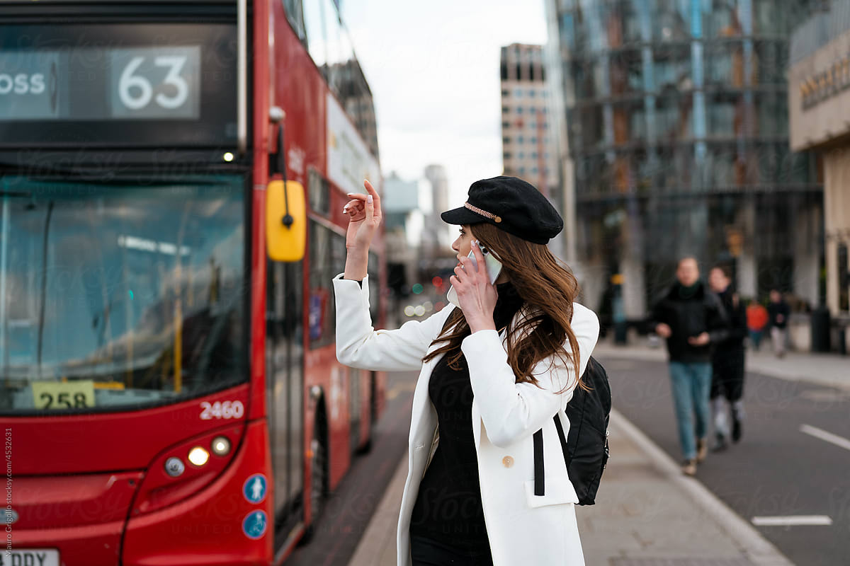 A woman stops the bus in London to change place