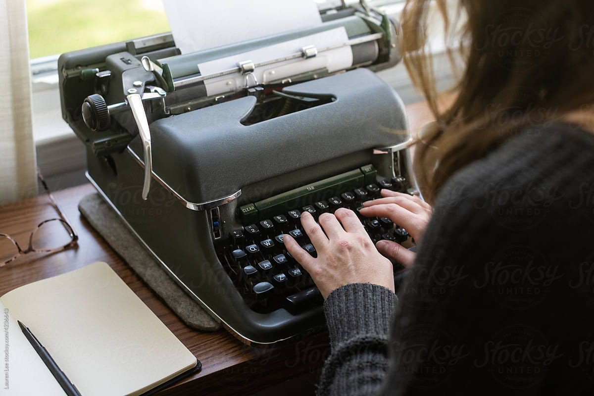 Little Kid Typing On Typewriter by Stocksy Contributor Lauren Lee -  Stocksy