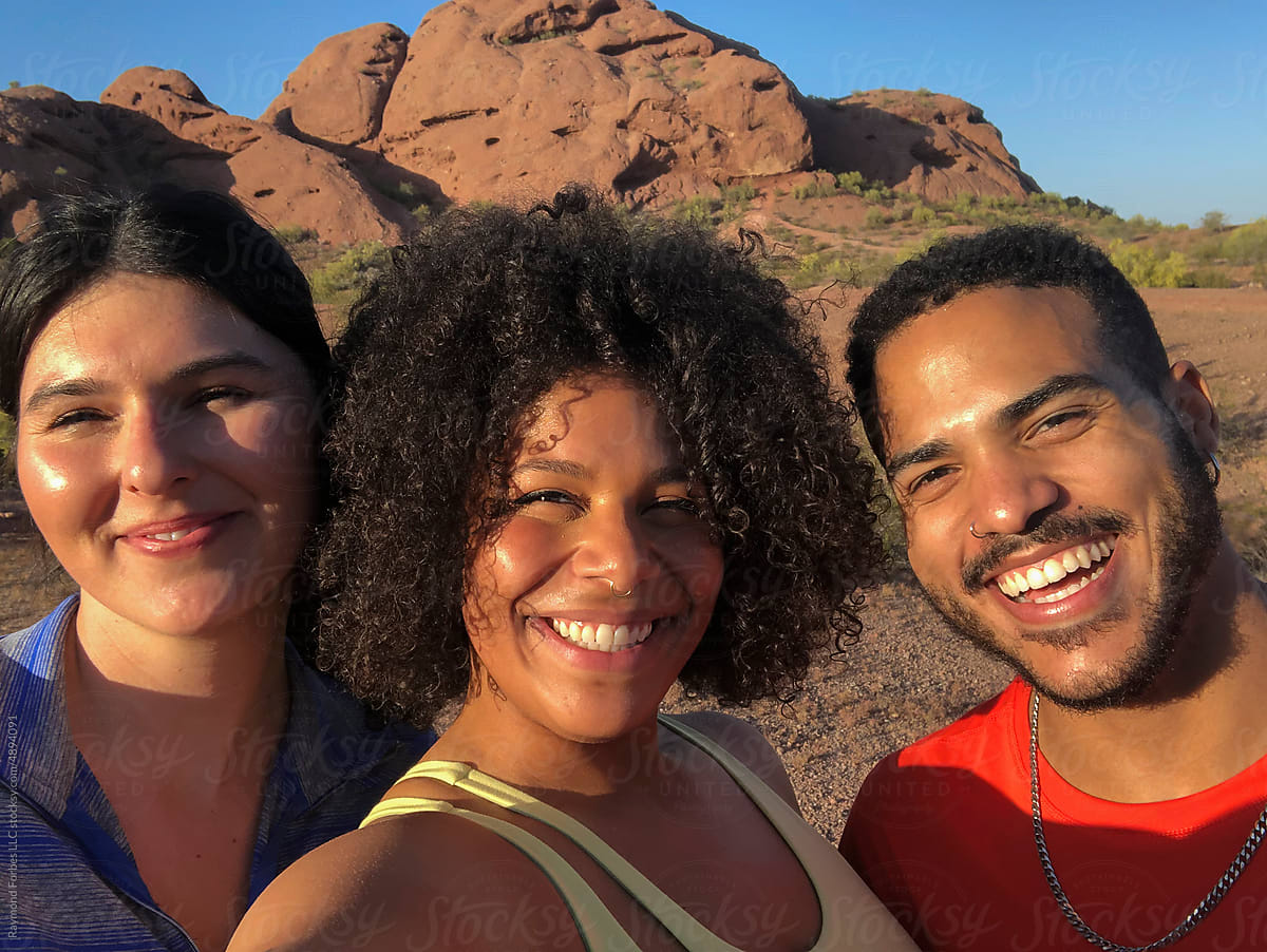Group of Friends Hiking together in Arizona taking mobile phone selfie