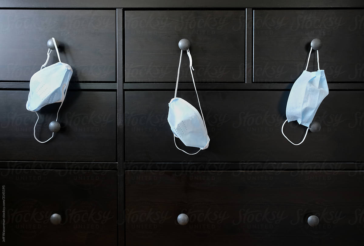 Medical Masks Hang from Dresser