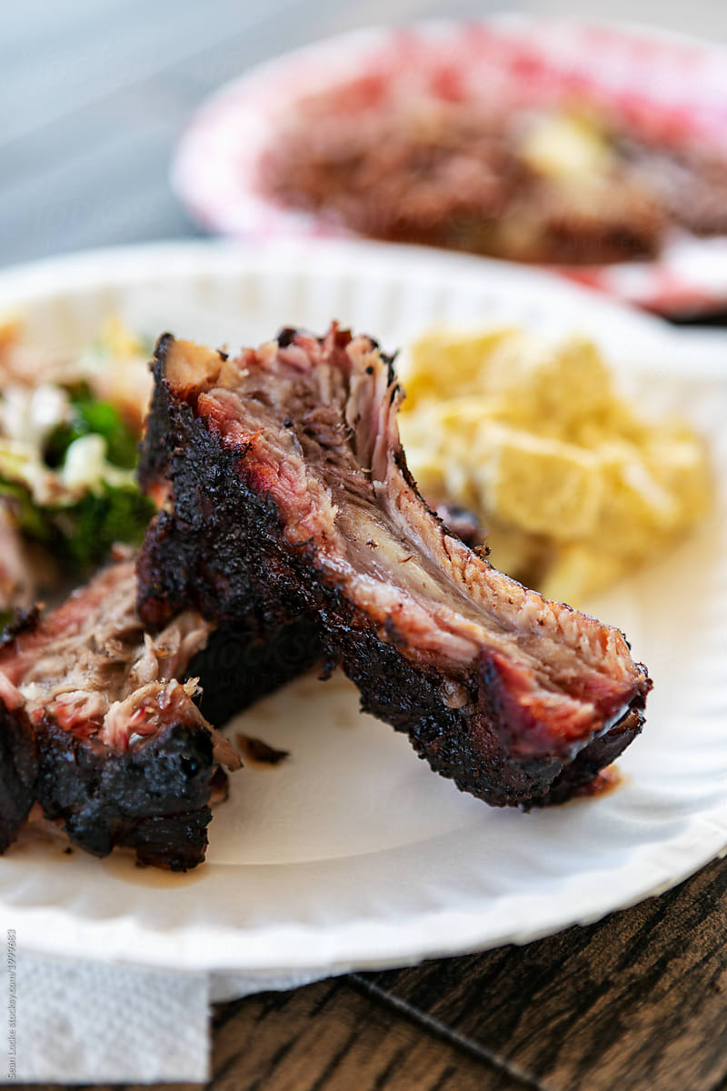 Smoked: Baby Back Ribs And Salads On Paper Plates