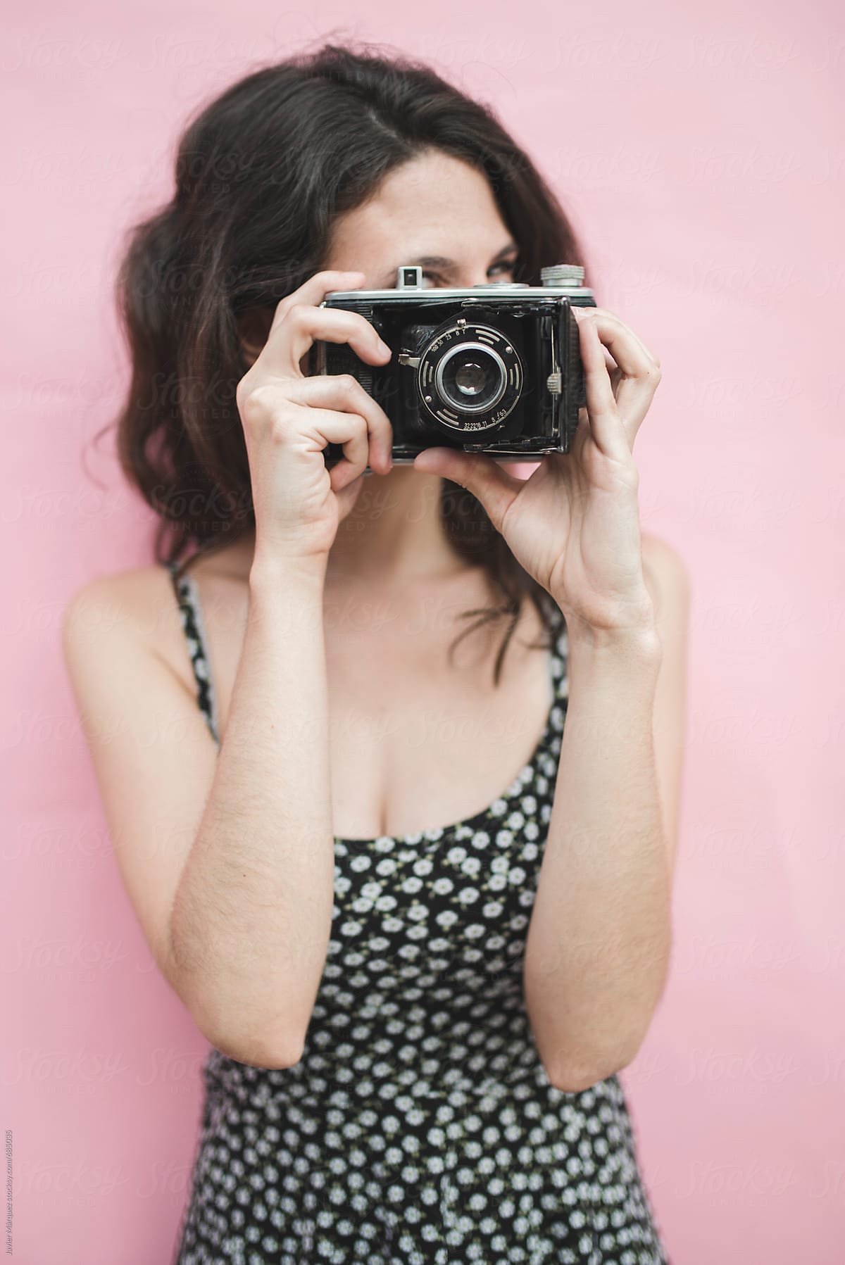 woman with old camera