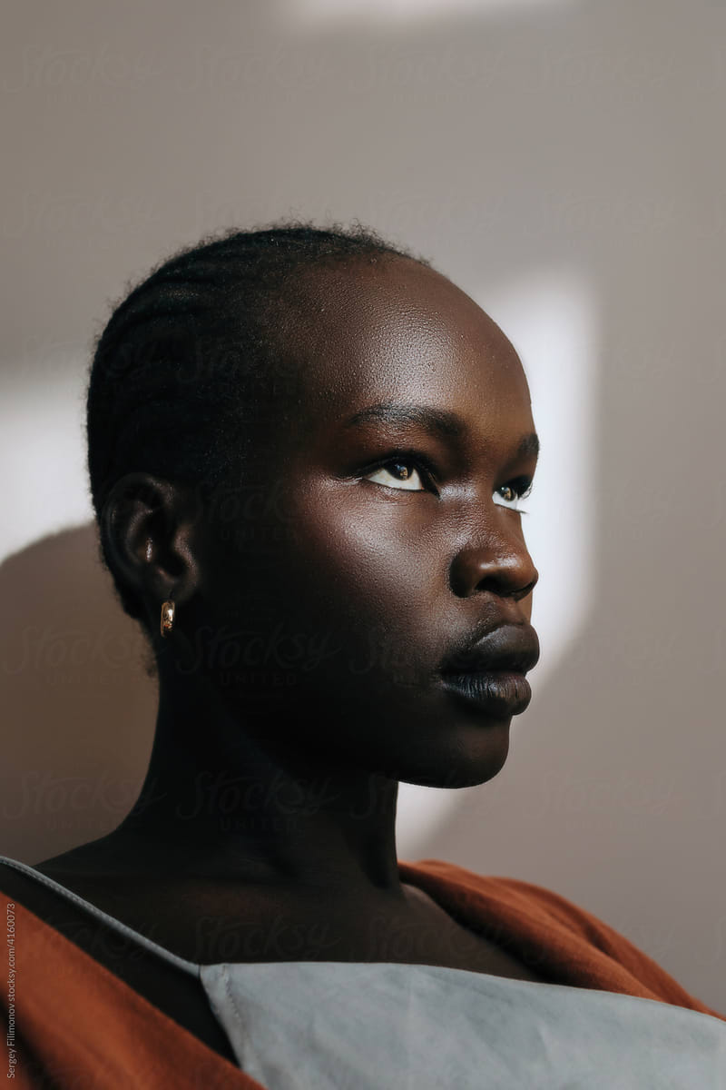 Black Woman studio portrait sunlight