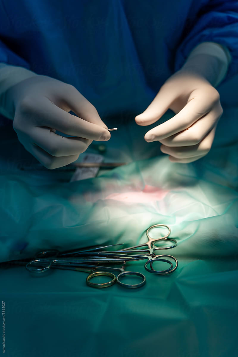 Close up view of surgeon operating.