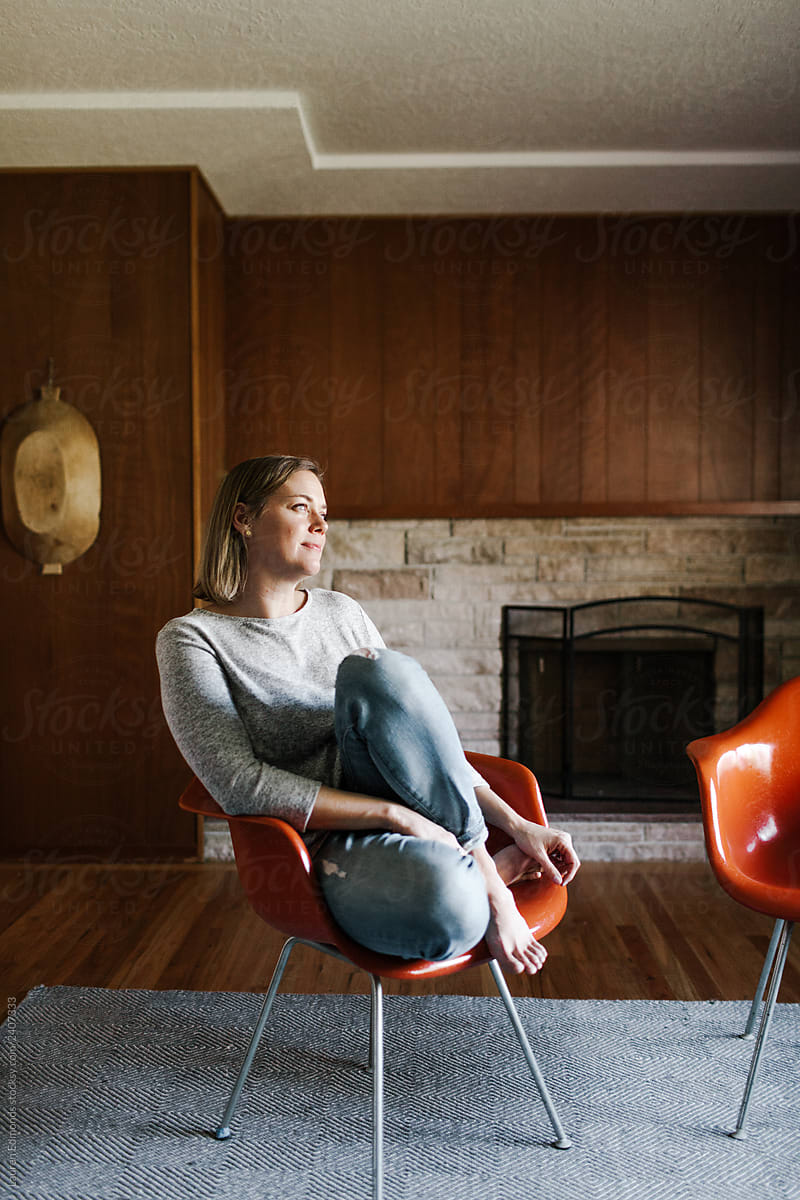 Smiling Blond Woman in Mid Century Home