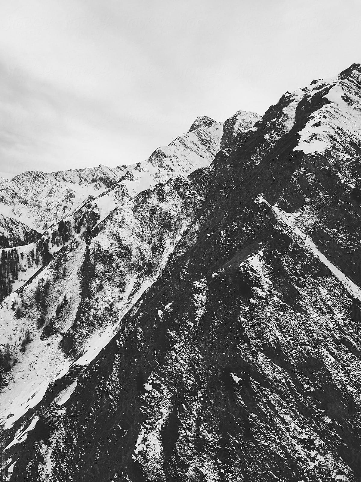 Mountains of Switzerland - Black and White Shot of Snow-Covered Alps