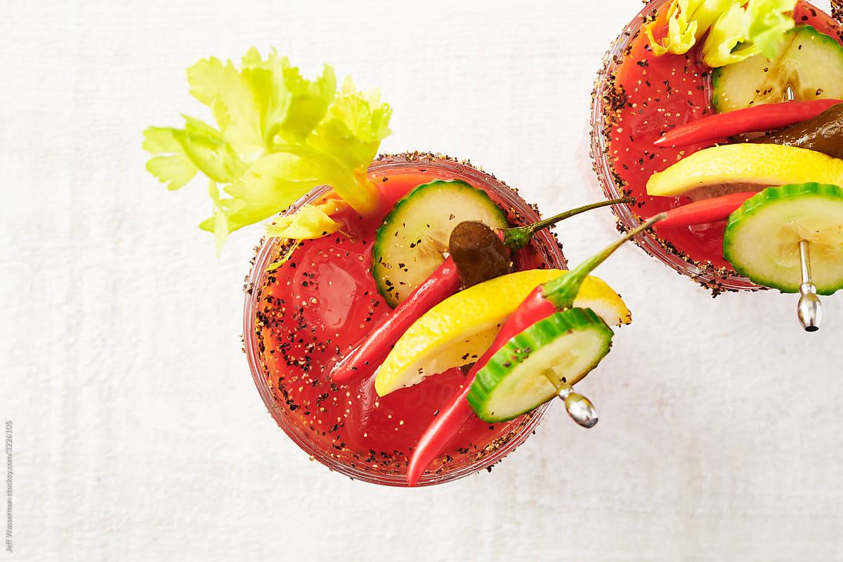 Two Bloody Mary Cocktails Loaded with Garnishes