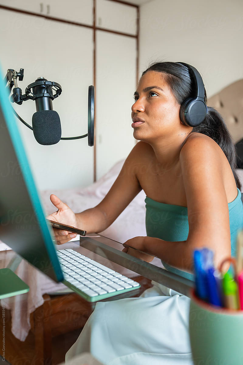 Woman recording a Podcast